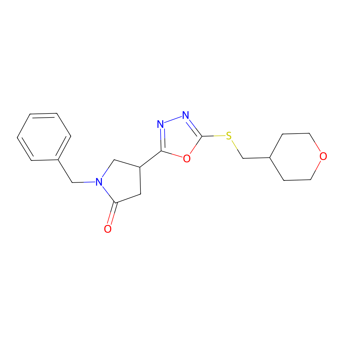 1-Benzyl-4-(5-{[(oxan-4-yl)methyl]sulfanyl}-1,3,4-oxadiazol-2-yl)pyrrolidin-2-one molecular structure, CAS 3054606-92-4